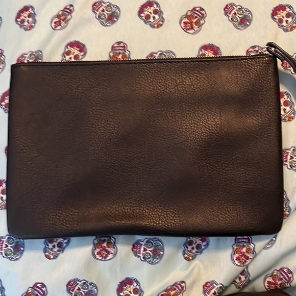 Unknown brand silver studded clutch in black with and attached strap. - Picture 3 of 4